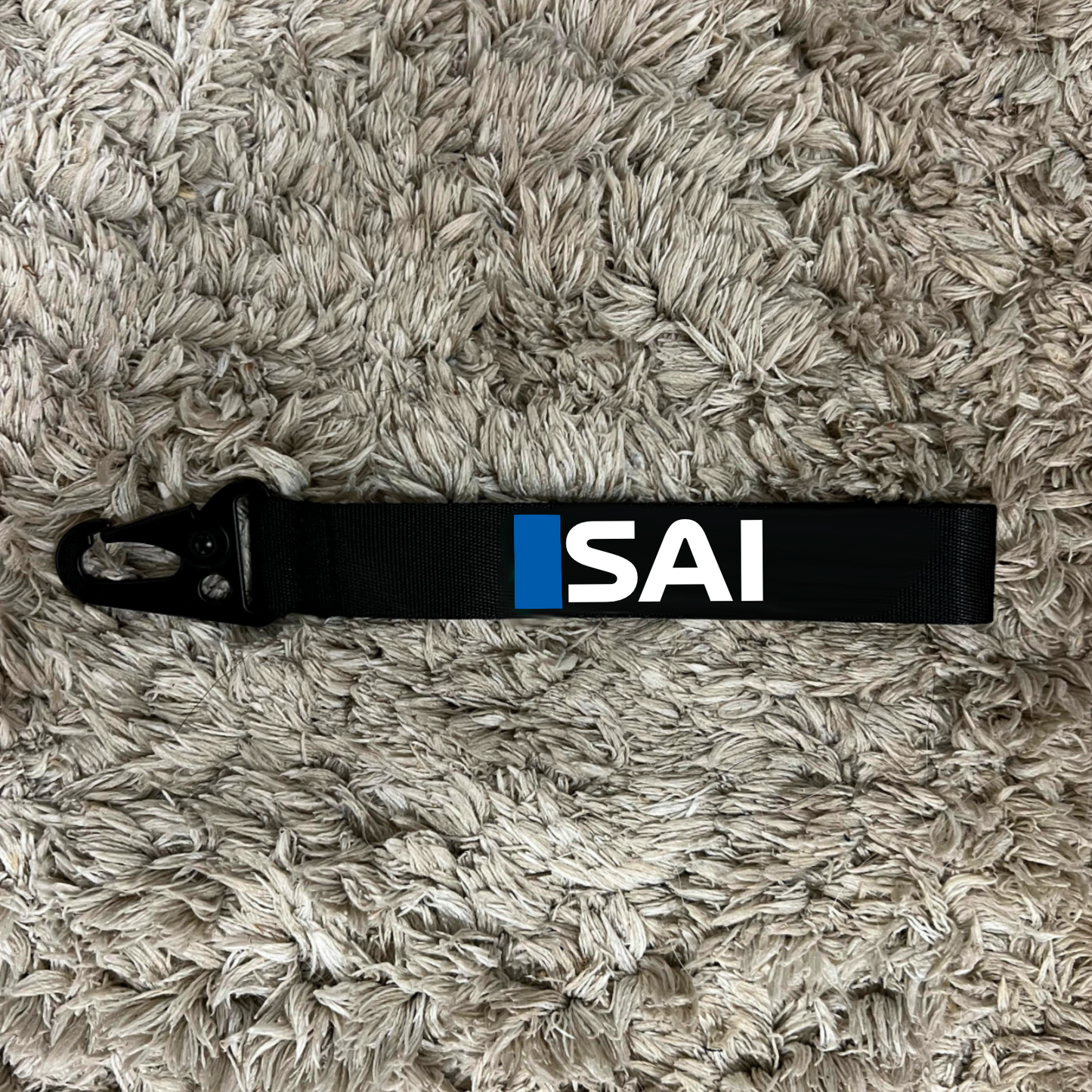 Carlos sainz 2025 inspired wristlet keychain.