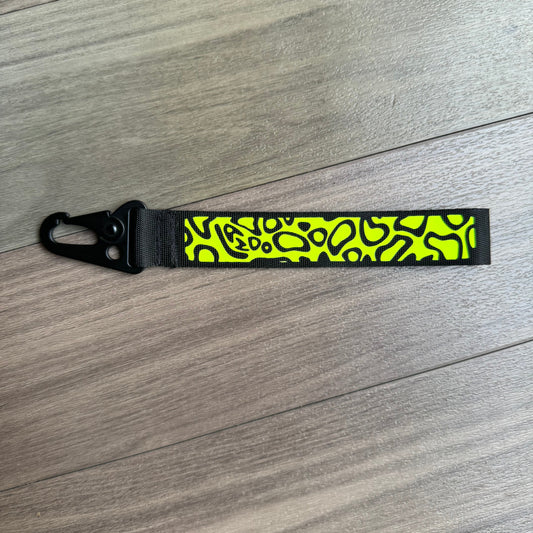 Lando Norris helmet inspired wristlet keychain.